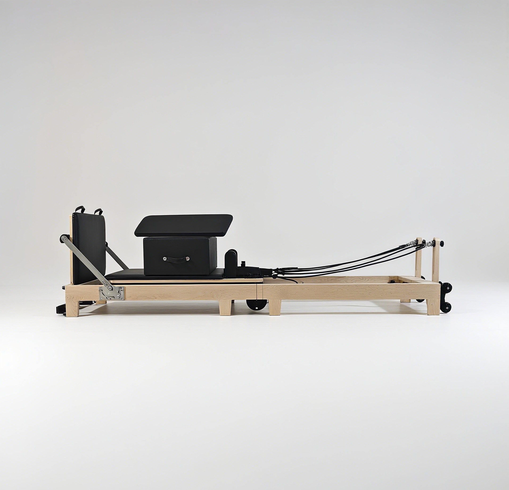 Pilates & Yoga Unleashed Studio Tuckahoe - Foldable Maple Wood Pilates Reformer with
